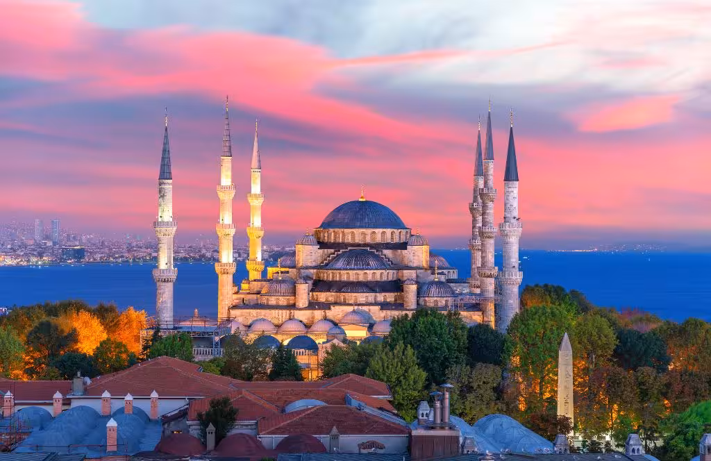 Istanbul skyline at sunset with domes and minarets