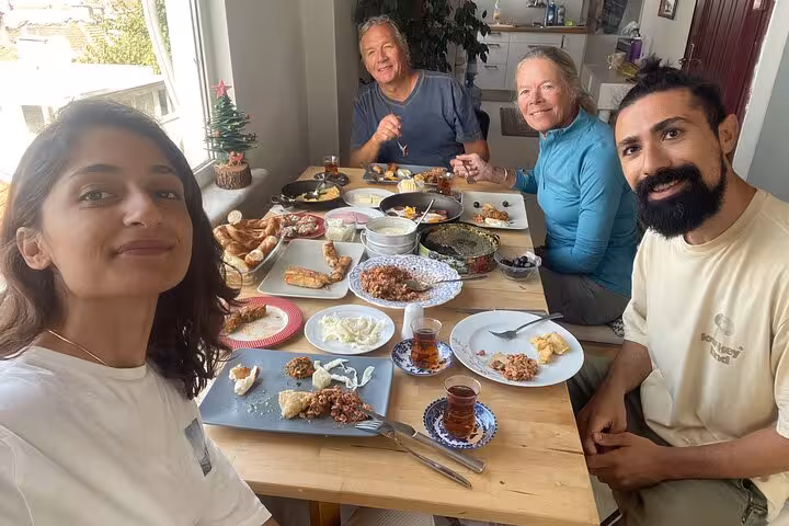 Guests share a healthy Turkish breakfast in Istanbul after yoga, tasting meze, pastries and Turkish tea