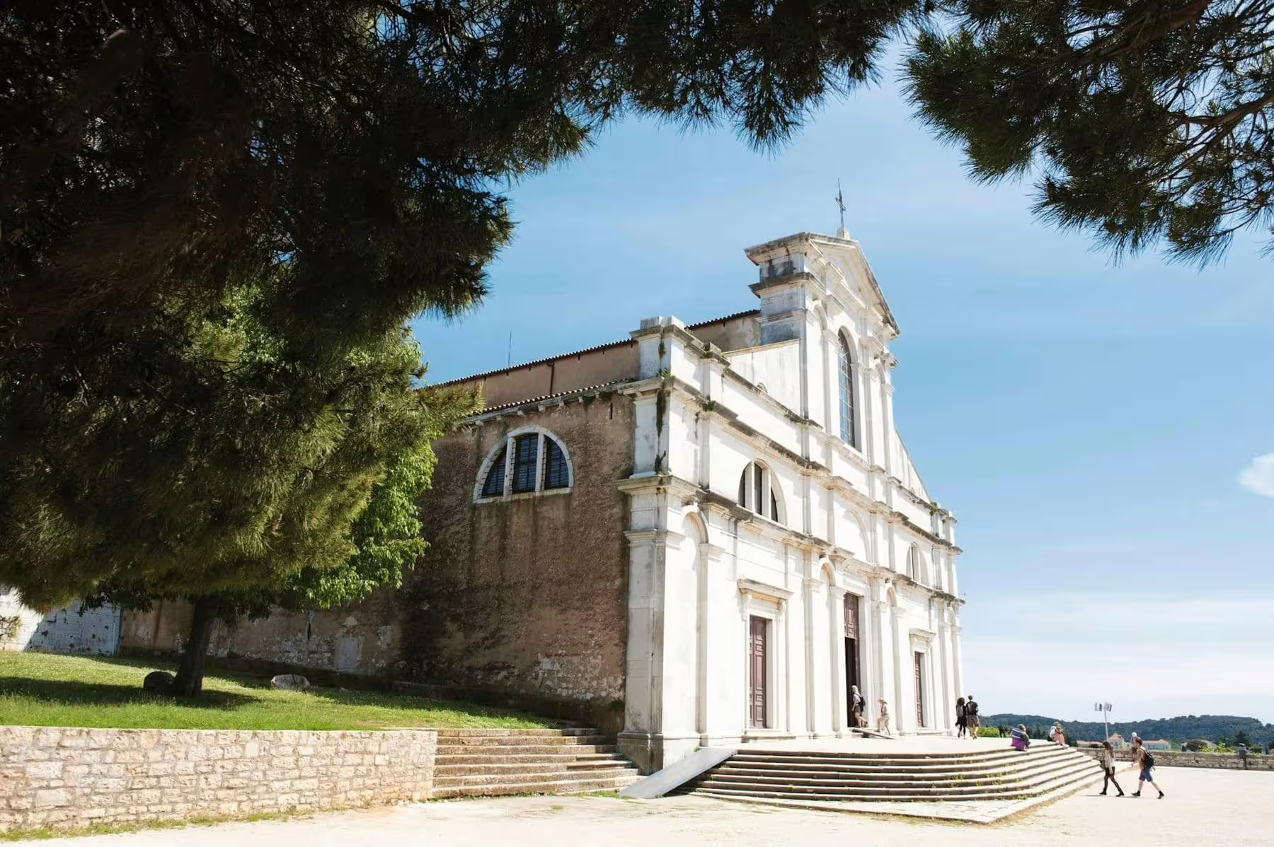 Historic coastal church near Poreč on the Istrian Coast cruise, a cultural stop on the boat trip with BBQ