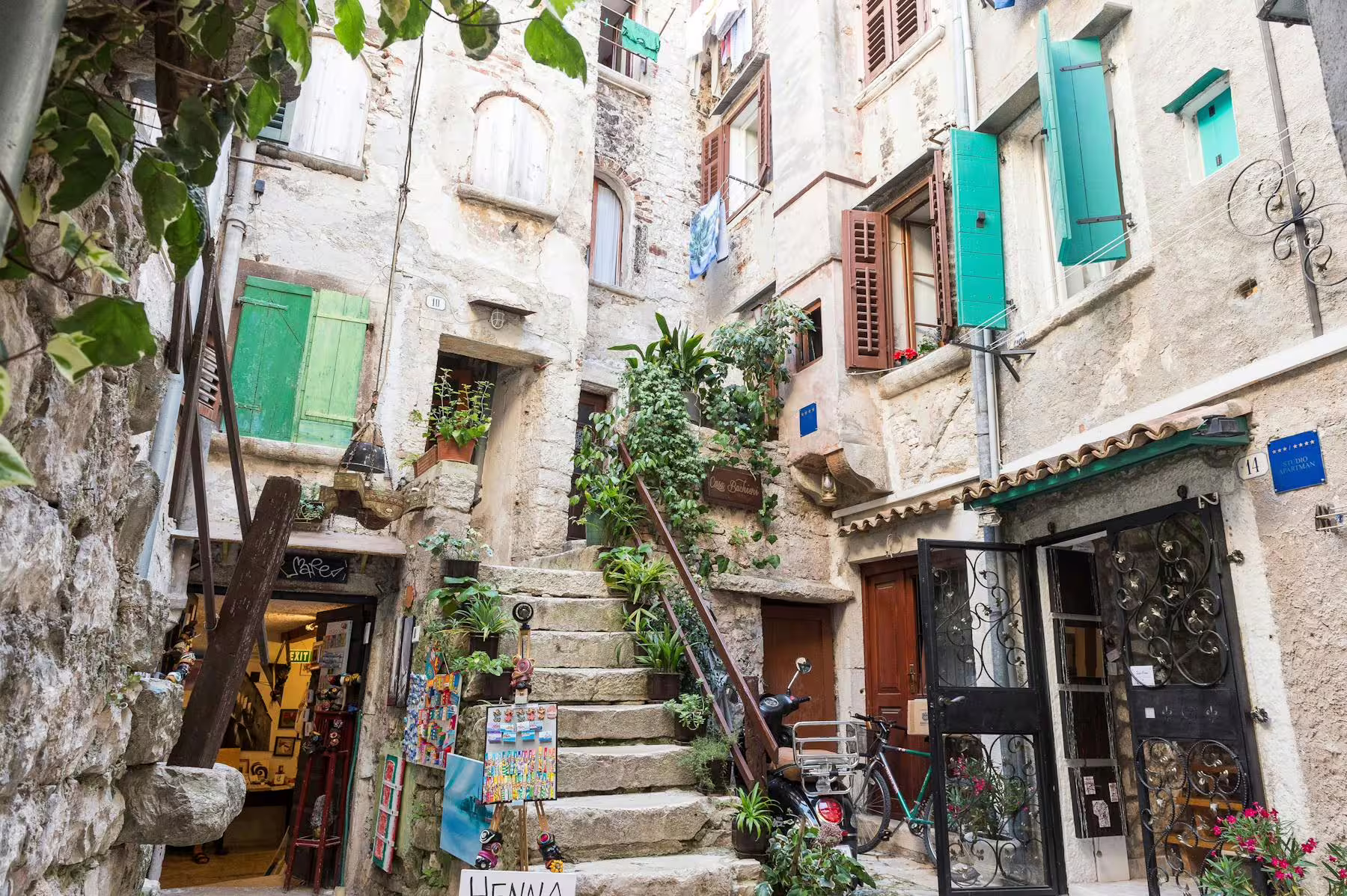 Stone alley with stairs and shutters in Istrian old town, scenic stop on Poreč boat cruise with BBQ