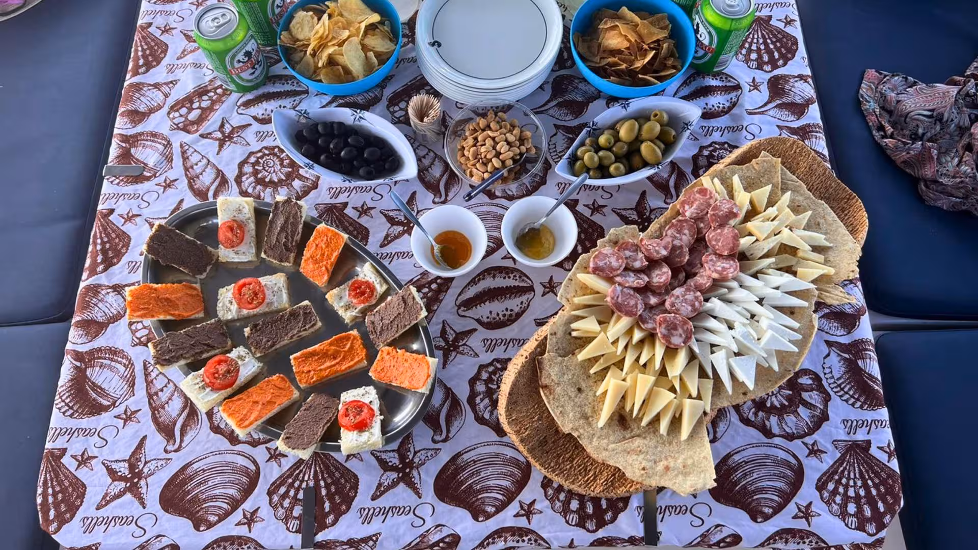 A delicious spread of local Italian appetizers on a catamaran tour in the La Maddalena Archipelago.