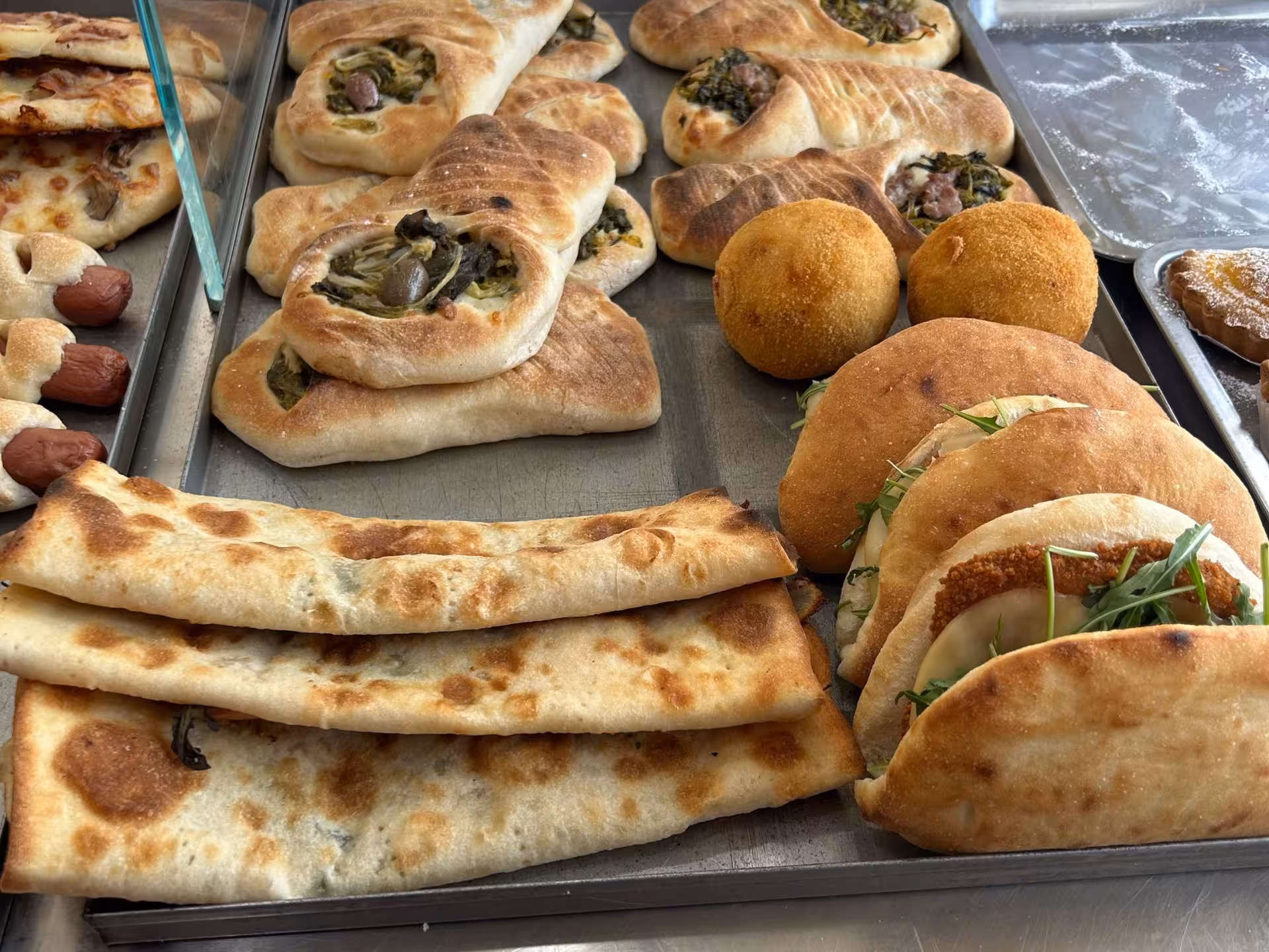 Assorted Italian pastries and breads for food pairing, enhancing the wine tasting experience at Lake Como.