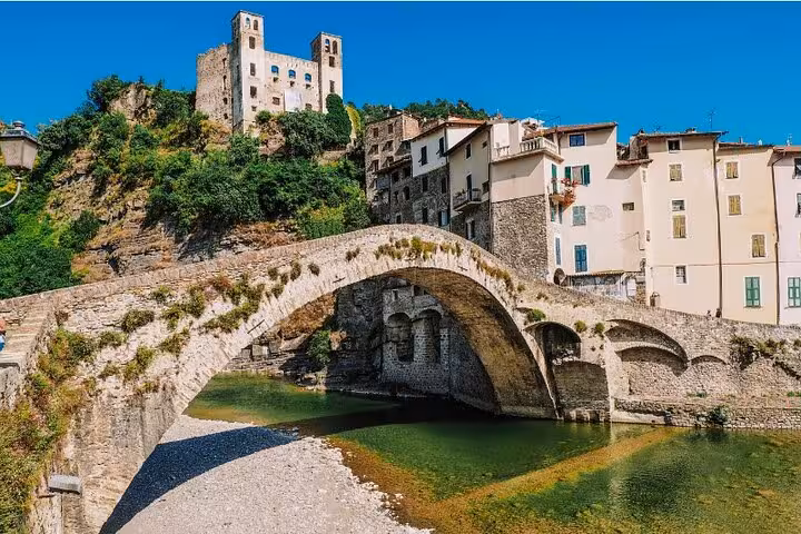 Picturesque view of medieval architecture and ancient stone bridge in Italy on the 3 countries in 1 day tour.