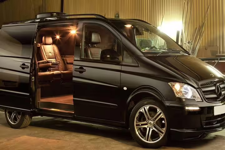 Executive Izmir Airport to Izmir center hotels VIP transfer, black Mercedes van with open door