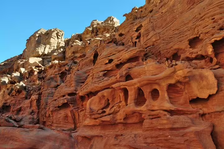 4x4 Jeep driving through Canyon Salama on a Sharm el Sheikh to Dahab safari tour in South Sinai desert