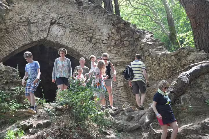 Tourists exploring ancient ruins during a Jeep Safari to the National Park from Kusadasi Port.