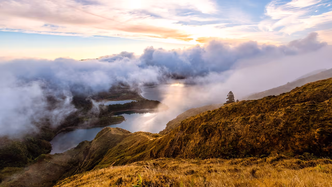 Sunrise clouds over Lagoa do Fogo viewpoint, São Miguel Azores, captured on a half-day 4x4 Jeep tour