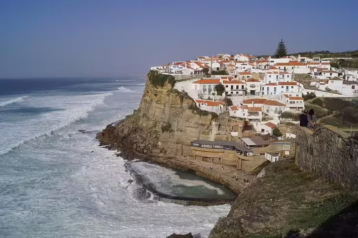 Scenic view of Azenhas do Mar's cliffside village and Atlantic Ocean on the Jeep Tour Sintra-Cascais route.