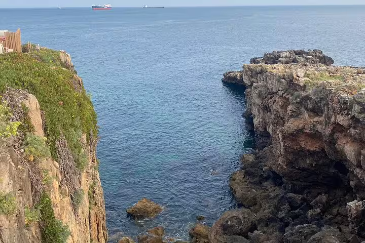Stunning cliffs and ocean view along the Sintra-Cascais coast, perfect for an adventurous Jeep tour exploration.