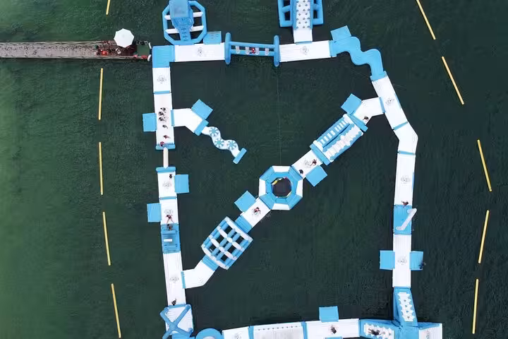 Aerial view of floating water park at Lagoa do Paraíso on Jericoacoara East Coast Tour, Ceará