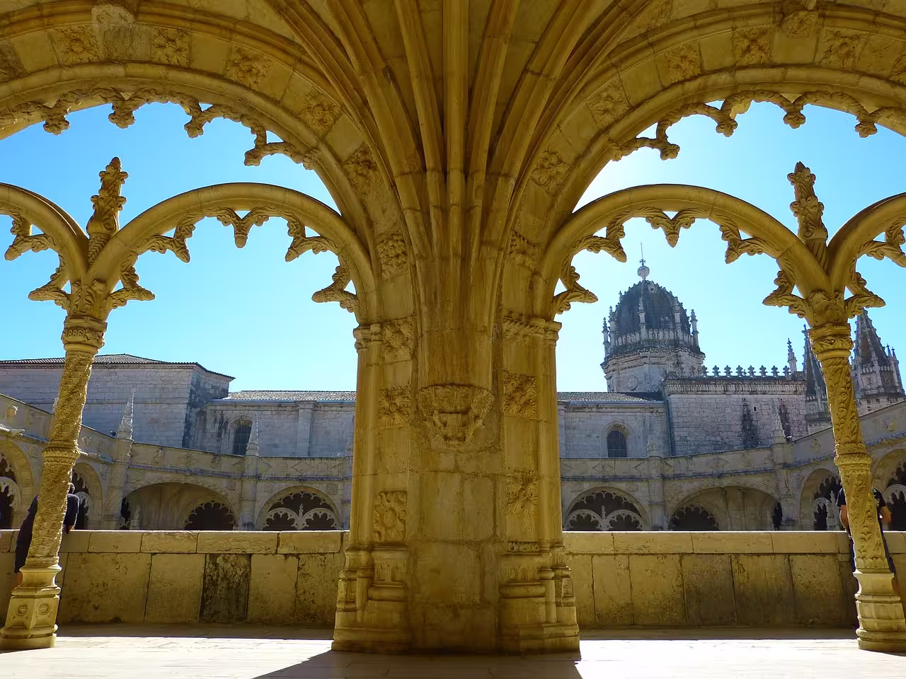 Explore the stunning arches of Jerónimos Monastery on a family-friendly Lisbon day tour.