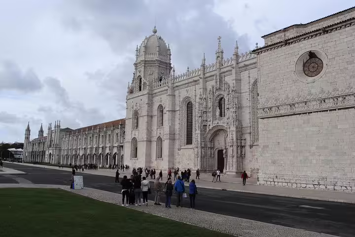 Visit the magnificent Jerónimos Monastery on a small group tour in Lisbon, featuring intricate Manueline architecture and rich history.