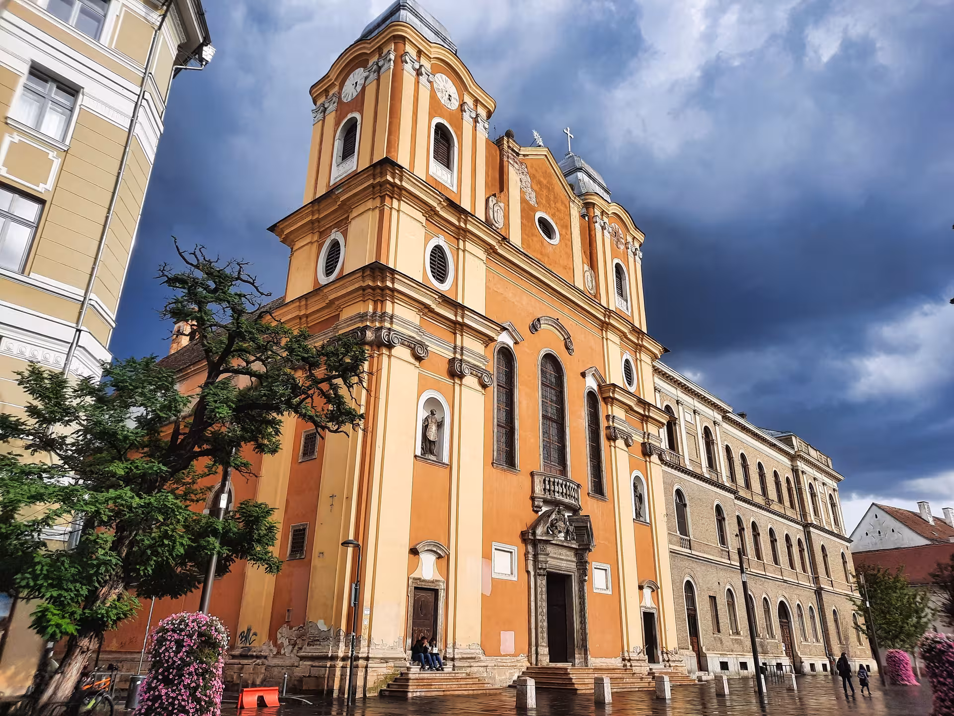 Iconic Jesuit Church baroque facade in Cluj-Napoca a must-see stop on guided history walking tours