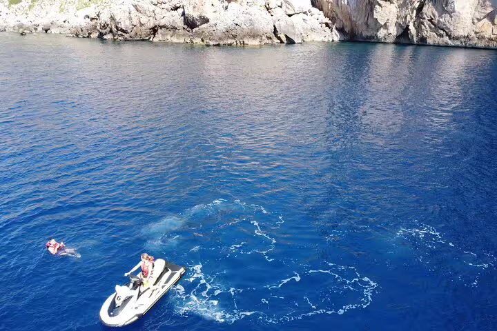 Close-up jet ski stop in crystal-clear Ibiza waters on the San Antonio to Es Vedrá jet ski tour
