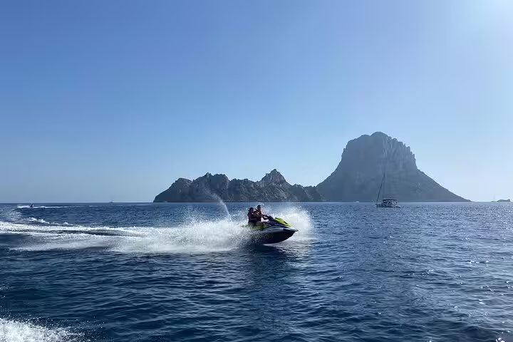 Jet ski ride from San Antonio Ibiza with Es Vedrà in the background, adrenaline splash on open sea