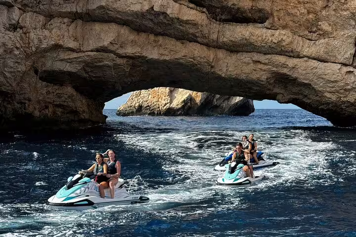 Jet ski tour from San Antonio Ibiza to Margaritas Islands passing through a sea cave arch