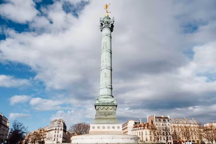 July Column at Place de la Bastille with golden angel statue on top, Paris landmark