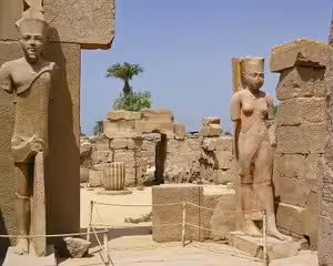 Ancient Egyptian statues and ruins at Karnak Temple complex, Luxor, Egypt