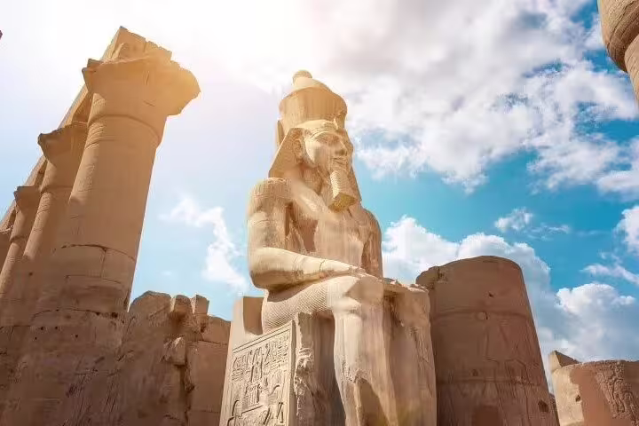 Colossal seated statue at Karnak Temple, Luxor day tour by plane from Sharm El Sheikh, Egypt highlights