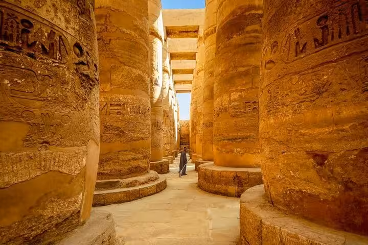 Karnak Temple column corridor with hieroglyphs on Luxor semi-private day tour from Hurghada with tickets