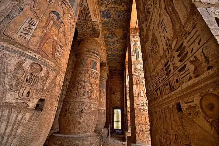 Karnak Temple columns carved with hieroglyphs, explored on a private Luxor day trip from Hurghada