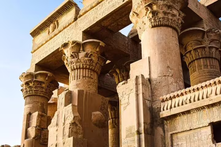 Karnak Temple columns and carved stone pillars in Luxor on a full-day private guided tour from Safaga Port