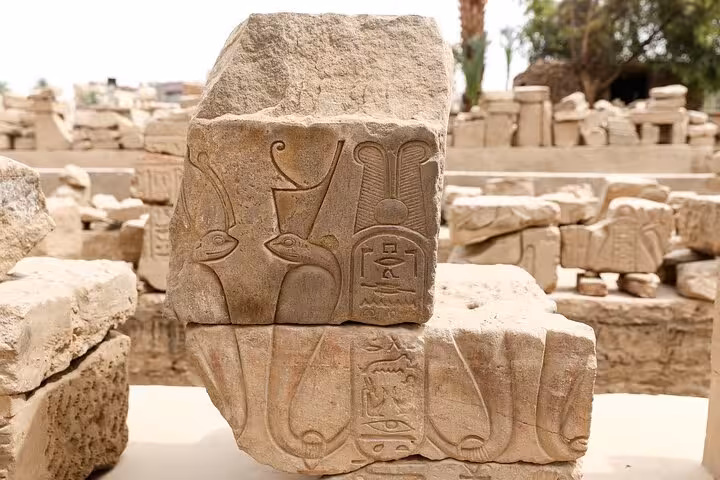 Ancient hieroglyph-carved stone block at Karnak Temple, Luxor on 2-day private tour from Hurghada