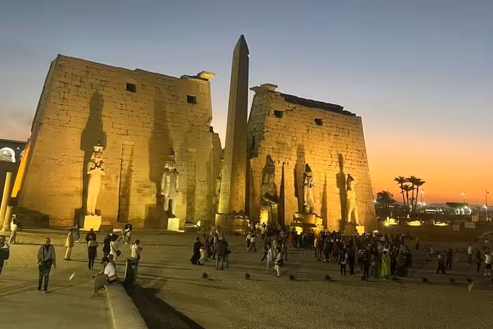 Karnak Temple entrance with obelisk at sunset on Luxor East Bank, private guided day tour experience