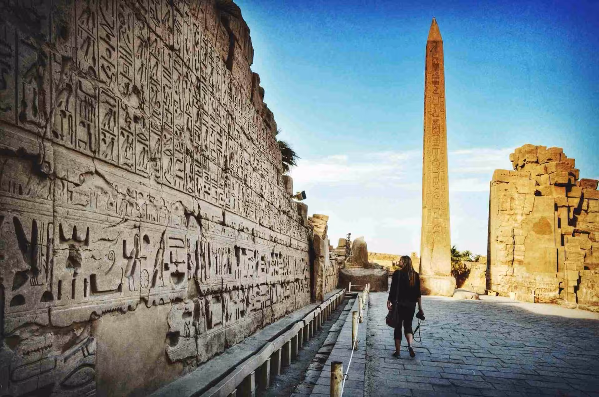 Karnak Temple in Luxor with hieroglyph walls and obelisk, highlight of 7-day Cairo Luxor Aswan air tour