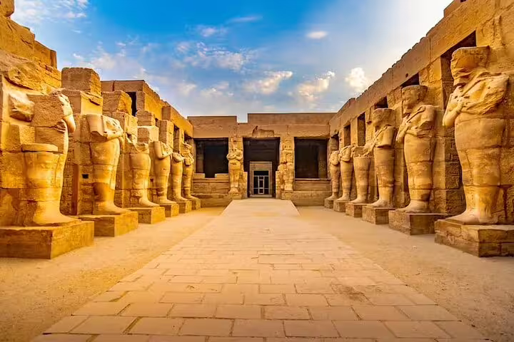 Avenue of ram-headed sphinx statues at Karnak Temple, Luxor historical day tour by plane from Sharm El Sheikh