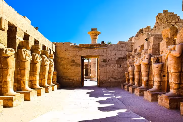 Avenue of ram-headed sphinx statues at Karnak Temple, highlight of full-day Luxor Valley of the Kings tour
