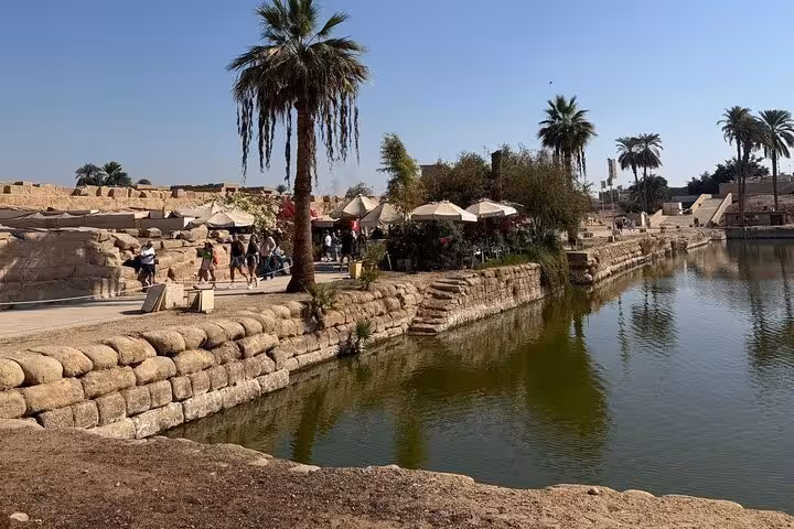 Palm-lined Sacred Lake at Karnak Temple, Luxor highlights tour from Hurghada with lunch and guided visit