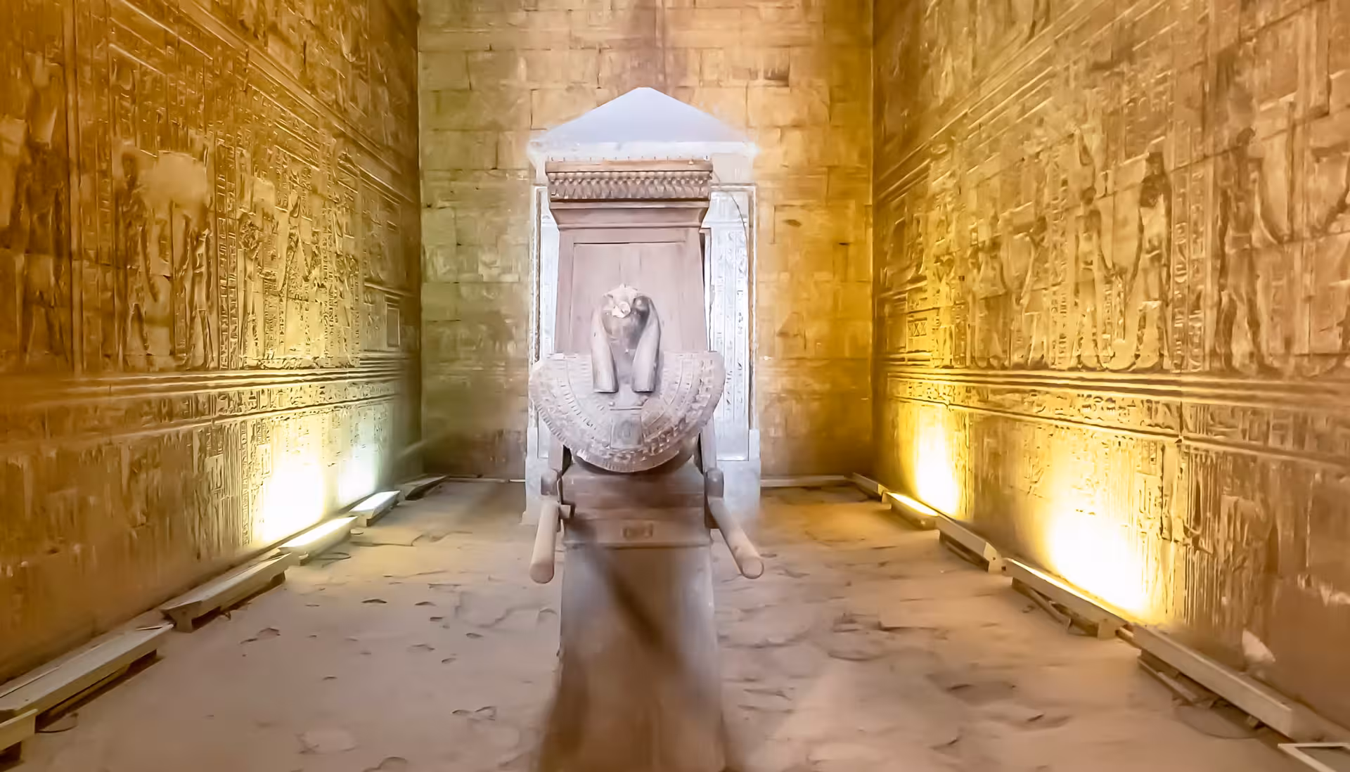 Sacred ram-headed sphinx and hieroglyph walls inside Karnak Temple, Luxor on a 7-day Egypt comfort tour