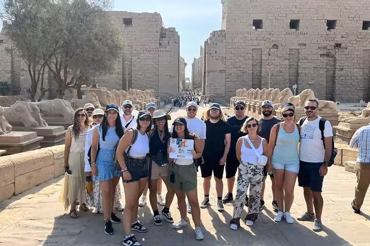 Group photo on Karnak Temple avenue of sphinxes, Luxor excursion from Marsa Alam with Valley of the Kings