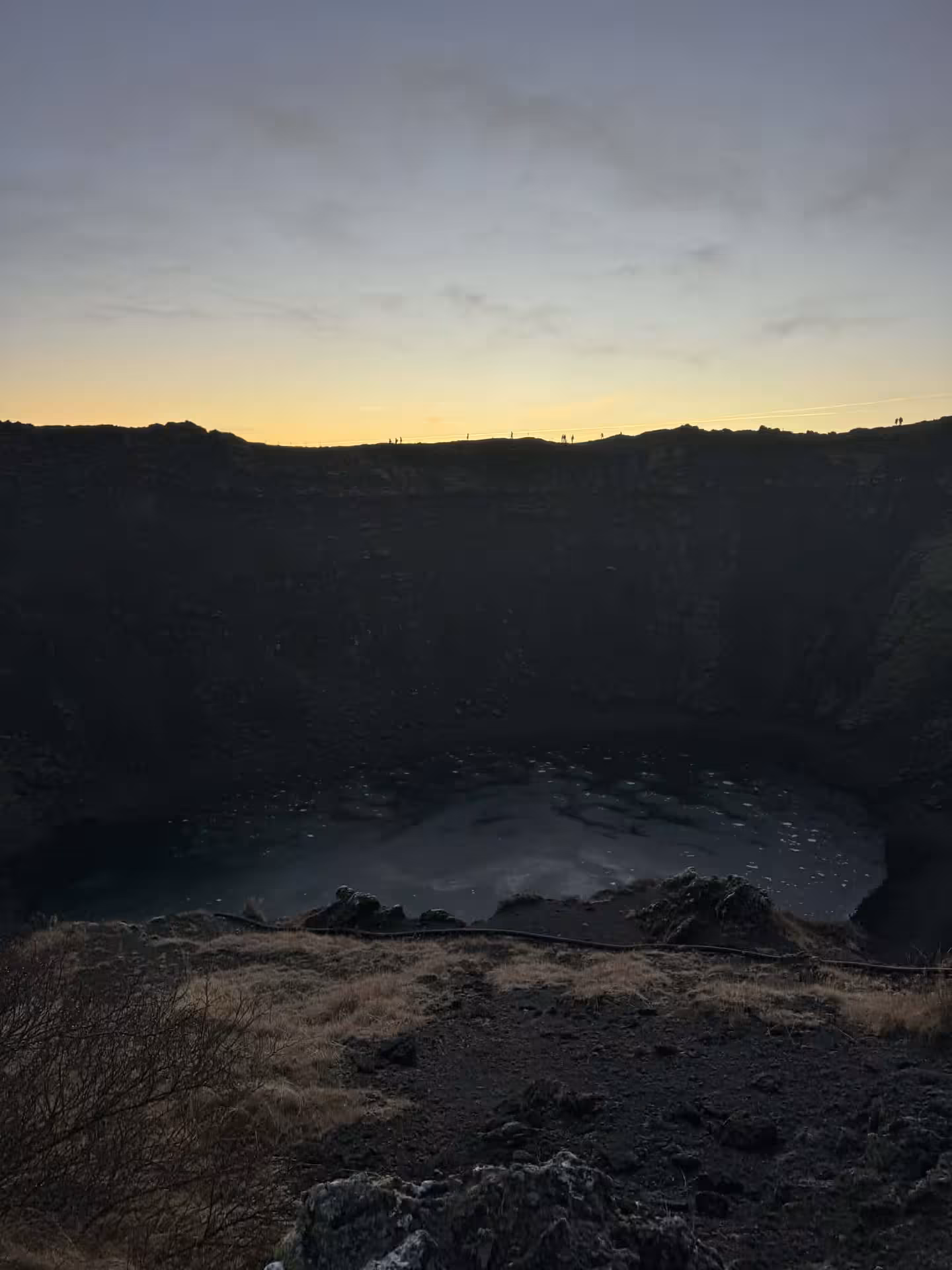Wide view of Kerid crater lake at dusk on Grand Golden Circle day tour from Reykjavik, Iceland