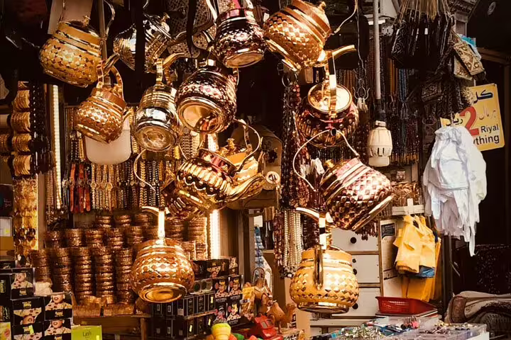 Khan el-Khalili bazaar stall with brass lanterns and metalware, stop on Historical Cairo Mosques tour