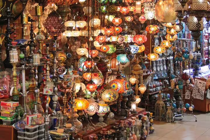 Colorful Khan El Khalili bazaar lanterns and souvenirs on Cairo tour from Alexandria with Port Said return
