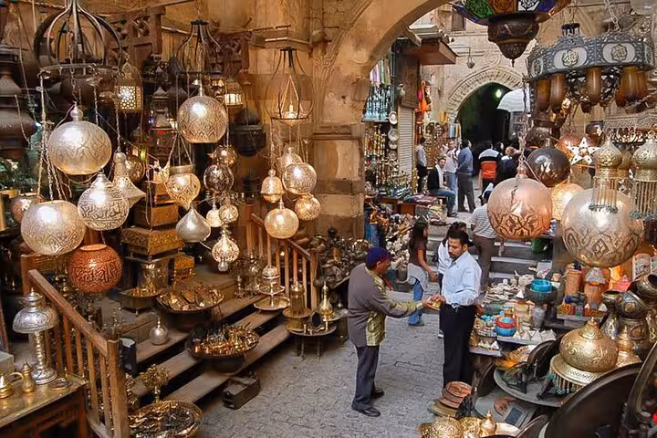 Khan El Khalili bazaar in Cairo with hanging lanterns and brassware, part of Sharm to Cairo air tour