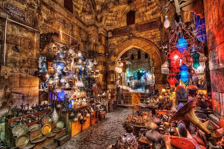 Khan el-Khalili bazaar alley with colorful lanterns and brassware, Islamic Cairo market tour stop