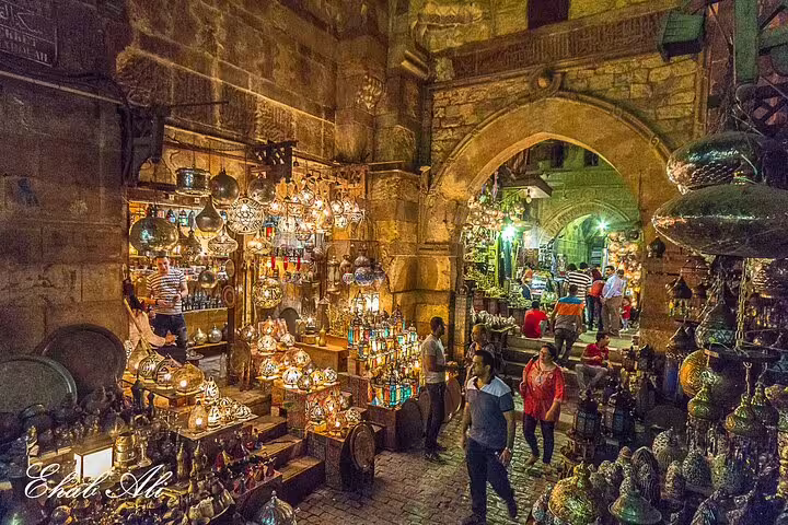 Crowds browsing lantern shops in Khan El-Khalili bazaar, Cairo, on Citadel and Old Cairo tour