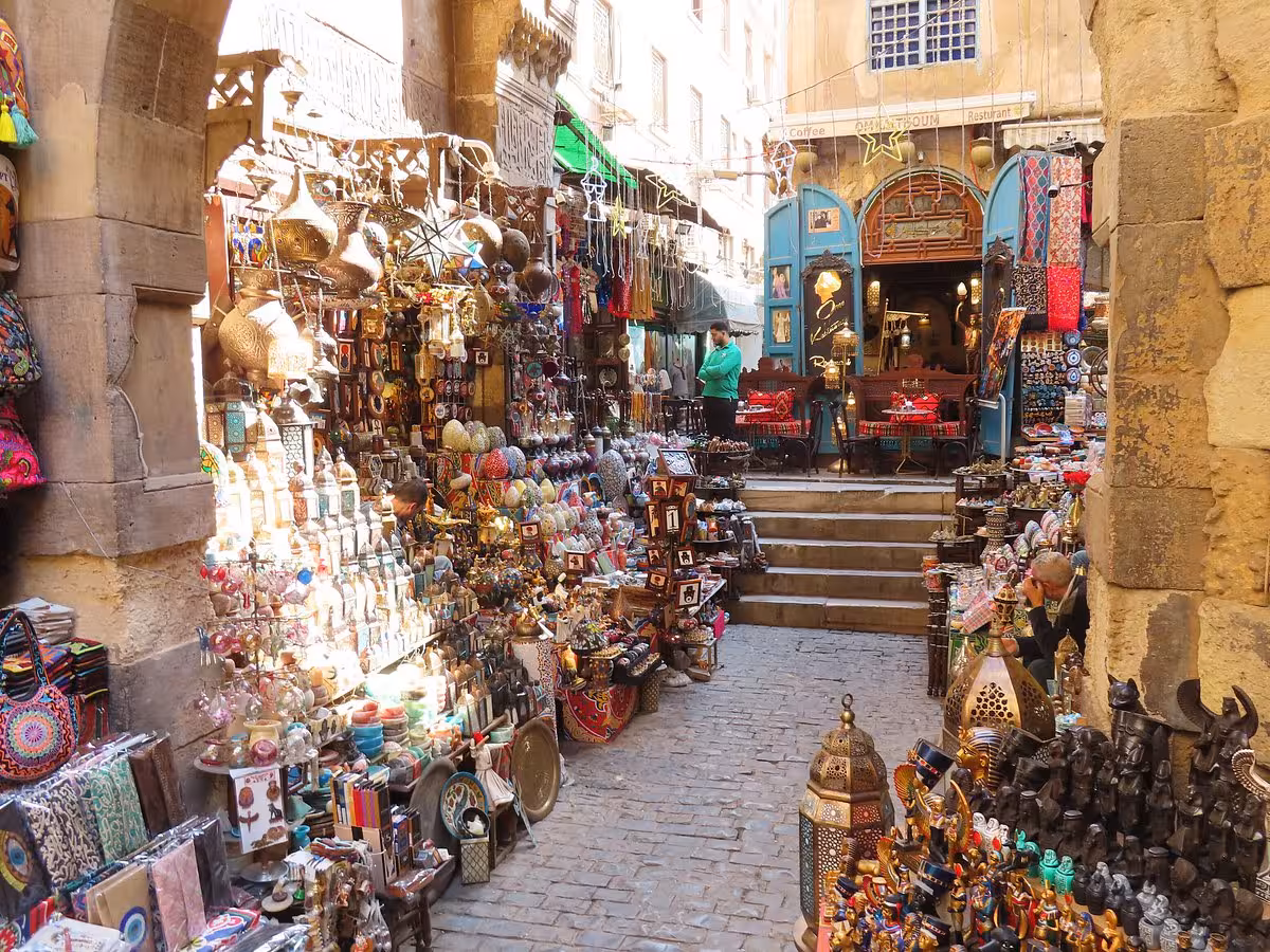 Khan el Khalili Market Cairo alley packed with lanterns, spices and souvenirs on guided shopping tour
