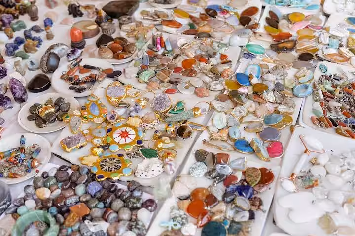 Colorful gemstone and silver jewelry display at Khan El Khalili bazaar, Cairo day tour shopping stop