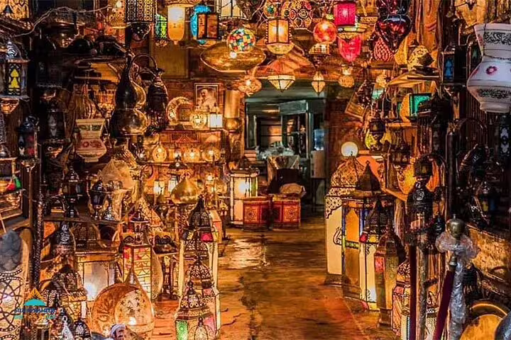 Colorful brass and glass lanterns inside Khan El Khalili Bazaar, highlight of El-Moez Street Cairo tour