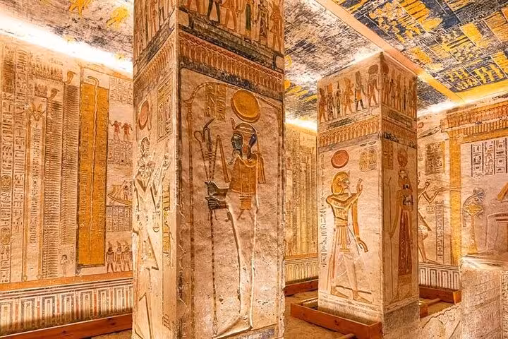 Painted pillars and hieroglyphs inside King Tutankhamun tomb, Valley of the Kings tour from Hurghada to Luxor