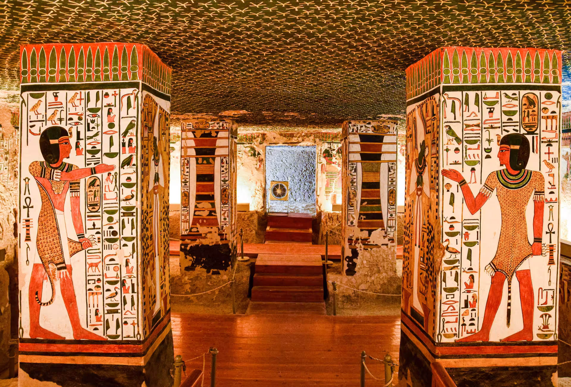 Colorful hieroglyph-painted pillars and walls inside King Tutankhamun's tomb in the Valley of the Kings