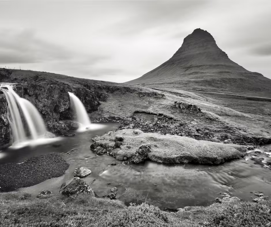 Kirkjufell mountain with cascading Kirkjufellsfoss waterfall in Iceland on Snaefellsnes Peninsula