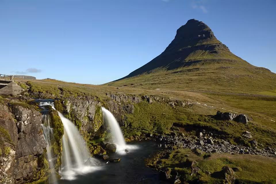 Kirkjufellsfoss waterfall with iconic Kirkjufell mountain backdrop on Snaefellsnes Peninsula, Iceland