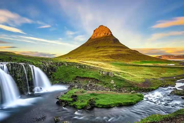Kirkjufell mountain with Kirkjufellsfoss waterfall at sunset, Snaefellsnes Peninsula, Iceland