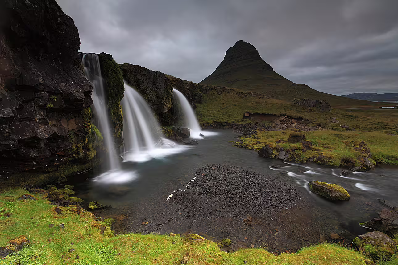 Kirkjufellsfoss waterfall with Kirkjufell mountain backdrop on Snaefellsnes Peninsula, Iceland