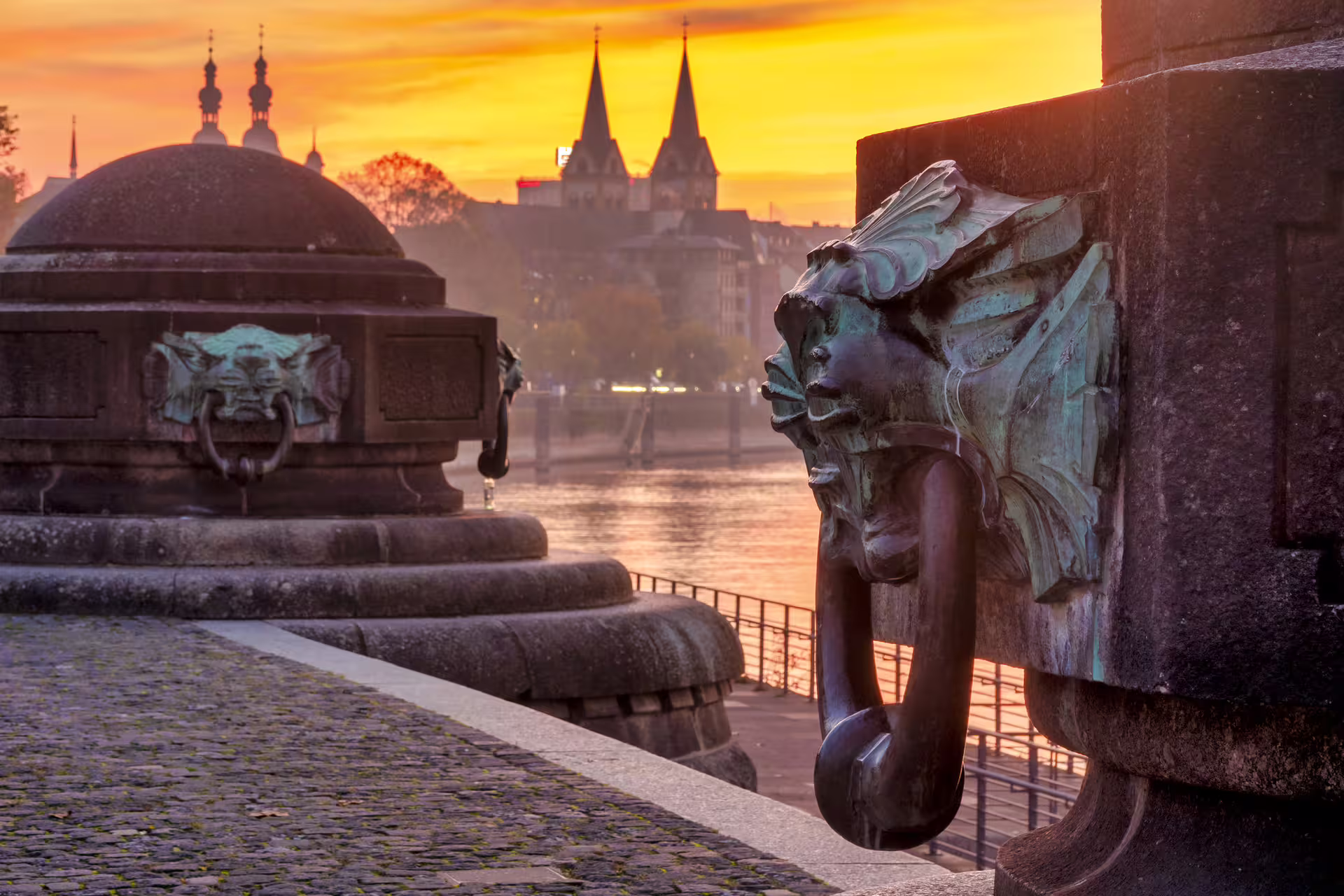 Gargoyle detail on Koblenz Rhine promenade at sunset, perfect for a 1-day walking tour audioguide